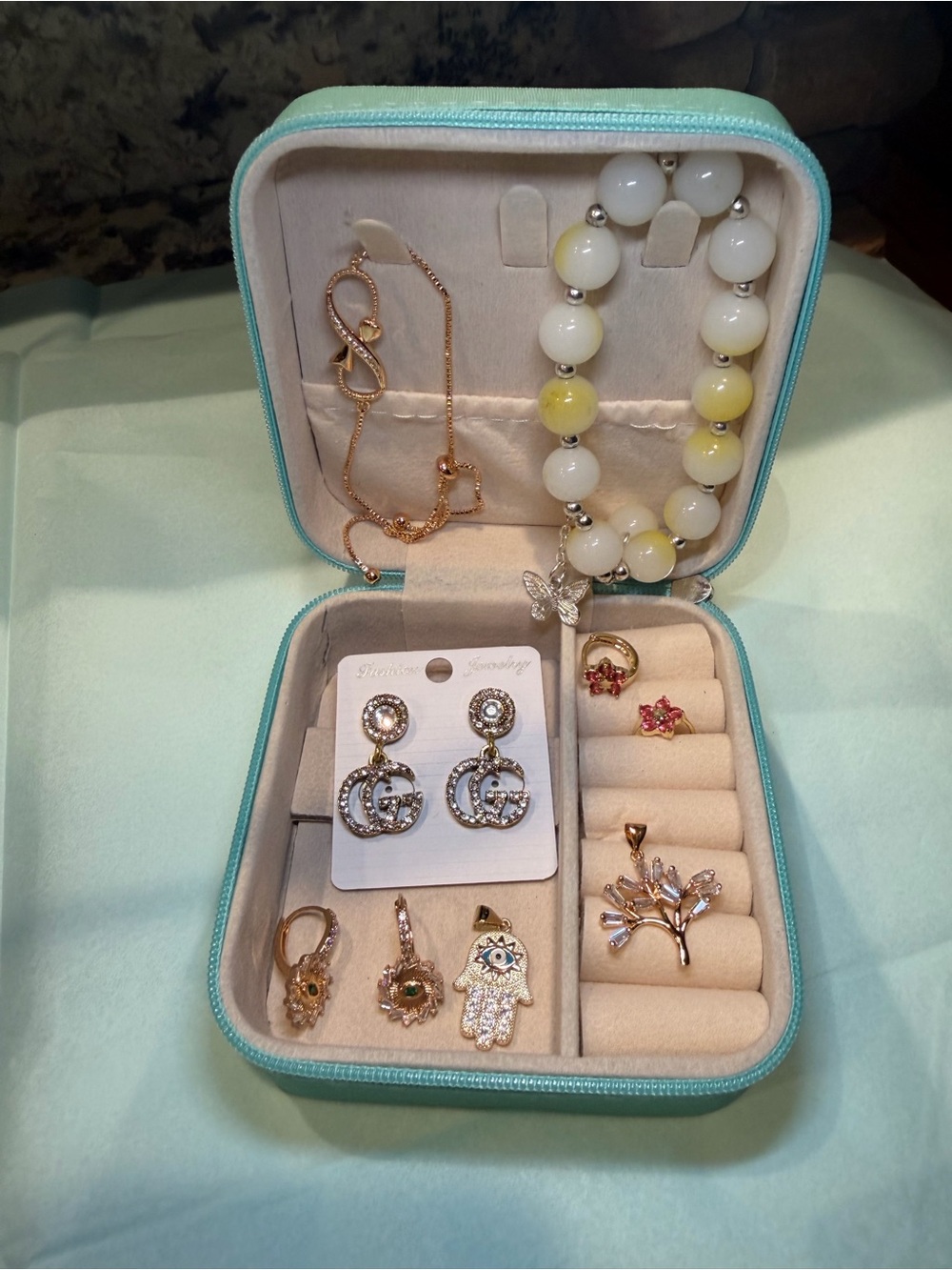 Multiple Jewelry Items Earrings Pendants Bracelets NWOT in Teal Travel Case